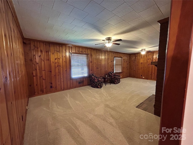 2009 Hickory Grove Rd, Gastonia, NC 28056 - empty room with carpet flooring, a ceiling fan, and wood walls