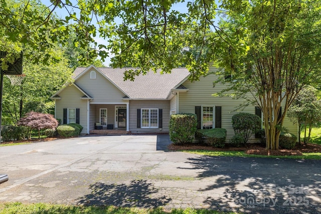 327 Wilby Dr, Charlotte, NC 28270 - view of front of property featuring a shingled roof and driveway
