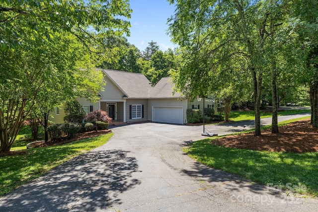 327 Wilby Dr, Charlotte, NC 28270 - view of front of home featuring asphalt driveway and an attached garage