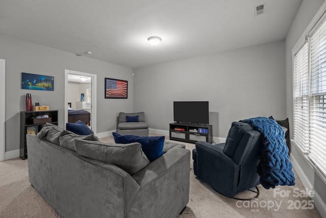 327 Wilby Dr, Charlotte, NC 28270 - living area featuring light carpet and baseboards