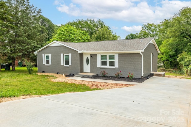 2511 Linwood Rd, Gastonia, NC 28052 - ranch-style house with driveway, brick siding, a front lawn, and roof with shingles