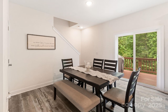 7308 Rothmore St, Charlotte, NC 28215 - dining space featuring light wood-style flooring, baseboards, and recessed lighting