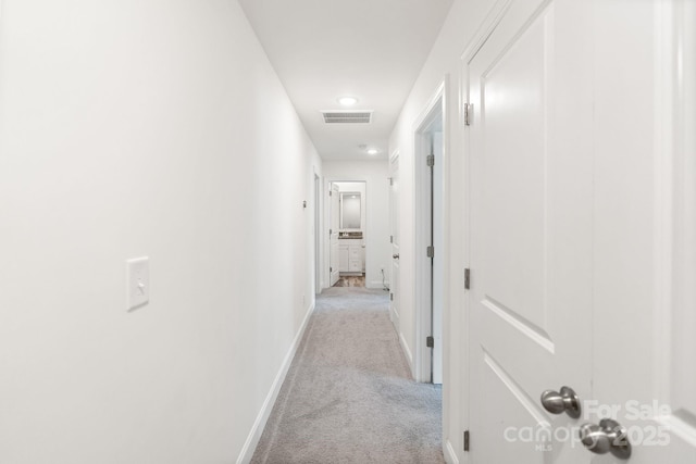 7308 Rothmore St, Charlotte, NC 28215 - hallway with light colored carpet, baseboards, and recessed lighting