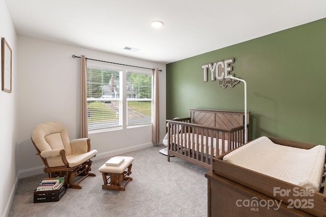 7308 Rothmore St, Charlotte, NC 28215 - bedroom featuring carpet flooring, baseboards, and a crib