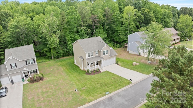 7308 Rothmore St, Charlotte, NC 28215 - aerial view of property and surrounding area featuring a forest