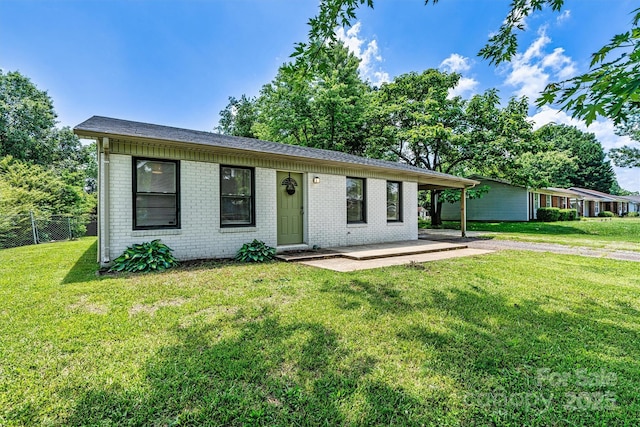 ranch-style home with brick siding