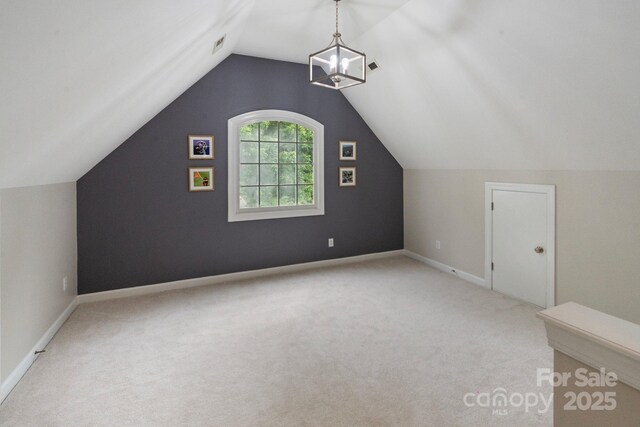 9433 Wallace Pond Dr, Huntersville, NC 28078 - bonus room with carpet, vaulted ceiling, and baseboards