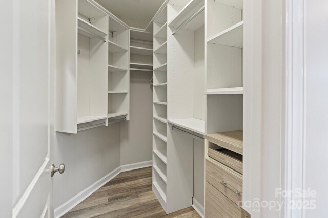 9433 Wallace Pond Dr, Huntersville, NC 28078 - spacious closet featuring wood finished floors