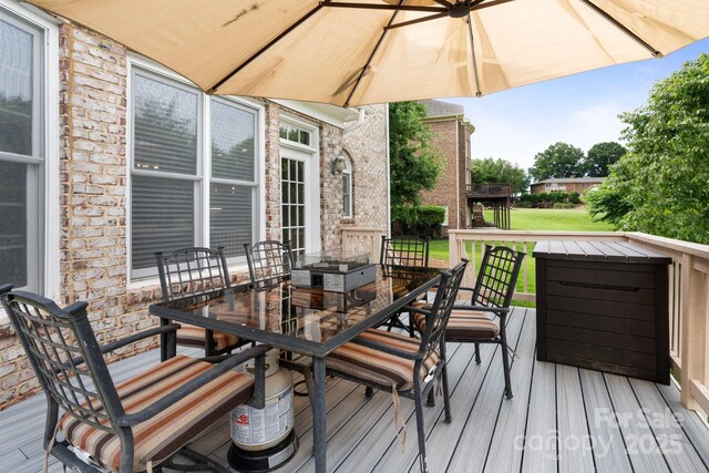 9433 Wallace Pond Dr, Huntersville, NC 28078 - deck with outdoor dining area and a yard
