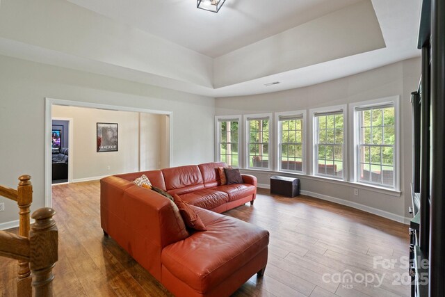 9433 Wallace Pond Dr, Huntersville, NC 28078 - living area featuring healthy amount of natural light, wood finished floors, and baseboards