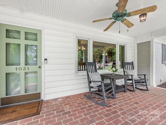 1031 Eldorado Ave, Charlotte, NC 28262 - sunroom featuring a ceiling fan and outdoor dining area