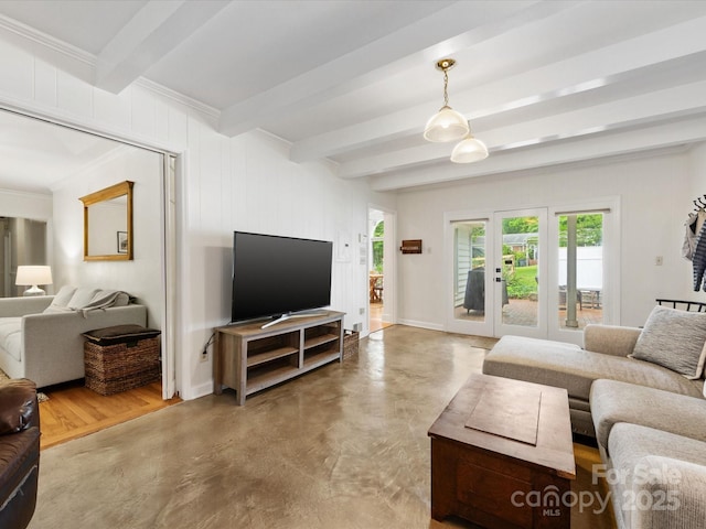 1031 Eldorado Ave, Charlotte, NC 28262 - living room with beam ceiling, concrete flooring, baseboards, and ornamental molding