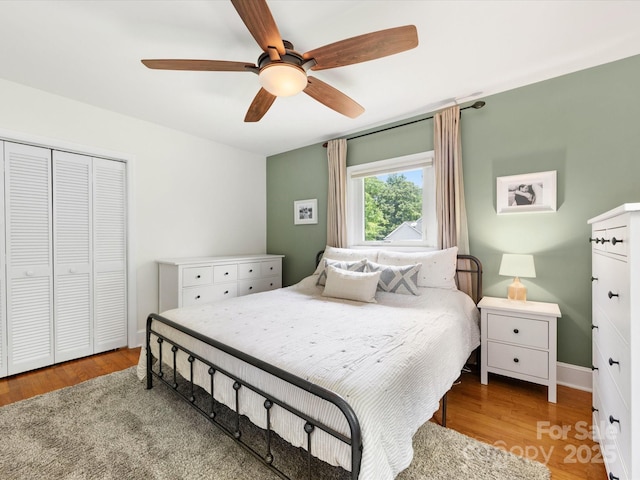 1031 Eldorado Ave, Charlotte, NC 28262 - bedroom with a closet, wood finished floors, and a ceiling fan