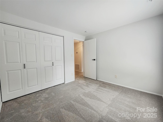 7228 Rollingridge Dr, Charlotte, NC 28211 - unfurnished bedroom with carpet floors, a closet, and baseboards