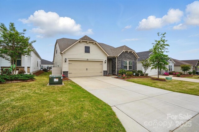 1825 Lotus Ln, Denver, NC 28037 - craftsman inspired home with concrete driveway, a front lawn, stone siding, and a shingled roof