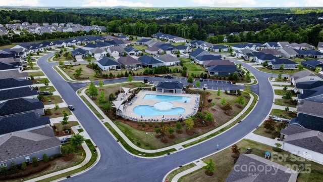 1825 Lotus Ln, Denver, NC 28037 - aerial overview of property's location featuring a pool, nearby suburban area, and a forest
