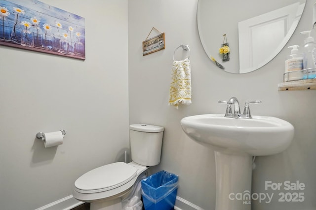 1825 Lotus Ln, Denver, NC 28037 - bathroom with baseboards, toilet, and a sink