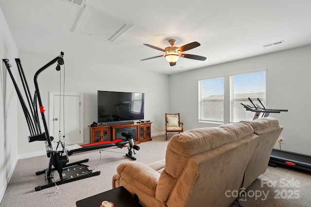 1825 Lotus Ln, Denver, NC 28037 - living room featuring carpet flooring, attic access, baseboards, and a ceiling fan