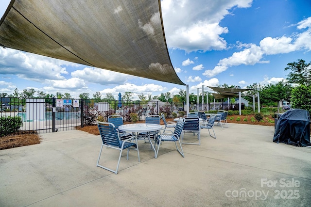 1825 Lotus Ln, Denver, NC 28037 - view of patio featuring fence, outdoor dining space, and a grill
