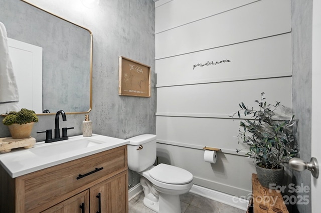 4842 Durneigh Dr, Kannapolis, NC 28081 - bathroom featuring toilet, vanity, and tile patterned flooring