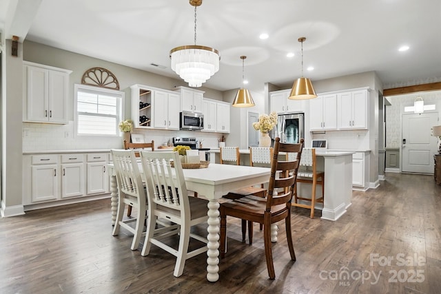 4842 Durneigh Dr, Kannapolis, NC 28081 - dining space with recessed lighting, dark wood finished floors, and a chandelier