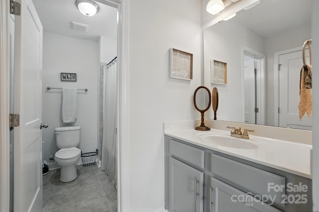 4842 Durneigh Dr, Kannapolis, NC 28081 - full bathroom with toilet, tile patterned floors, and vanity
