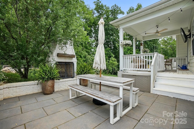 4842 Durneigh Dr, Kannapolis, NC 28081 - view of patio / terrace featuring exterior fireplace and a ceiling fan