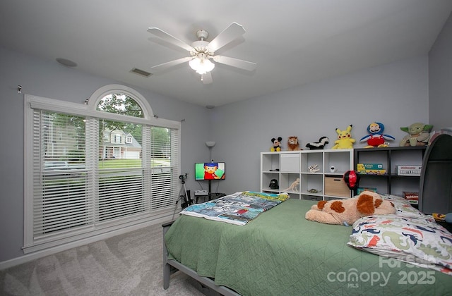 carpeted bedroom with a ceiling fan
