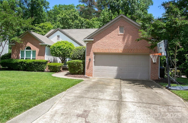 view of front of property with brick siding, concrete driveway, a front lawn, and a garage