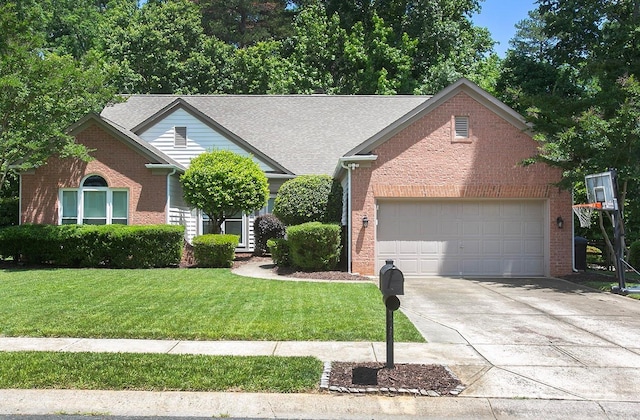 view of front of house featuring a front lawn, brick siding, an attached garage, and concrete driveway