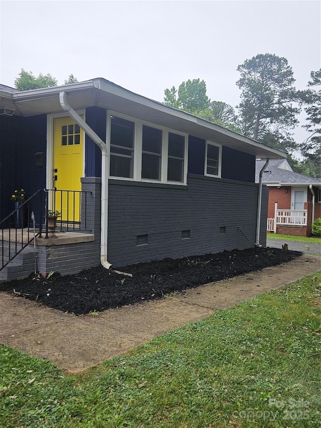 1412 Wembley Dr, Charlotte, NC 28205 - view of side of property with crawl space and brick siding