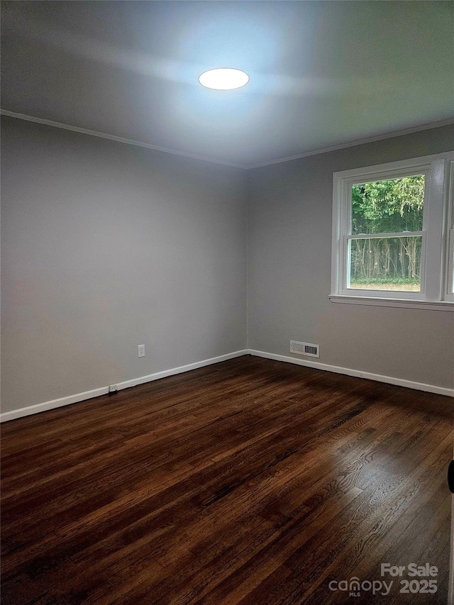 1412 Wembley Dr, Charlotte, NC 28205 - empty room featuring dark wood-style floors and baseboards