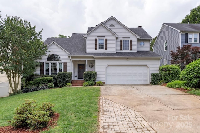 8605 Tamarron Dr, Charlotte, NC 28277 - traditional-style home with driveway, a garage, a front yard, and a shingled roof