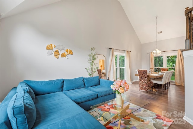 8605 Tamarron Dr, Charlotte, NC 28277 - living room with high vaulted ceiling, wood finished floors, and baseboards
