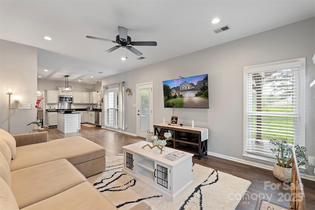8605 Tamarron Dr, Charlotte, NC 28277 - living room featuring dark wood-style floors, ceiling fan, baseboards, and recessed lighting