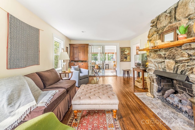 6 Craggy Cir, Asheville, NC 28803 - living area featuring wood finished floors and a stone fireplace