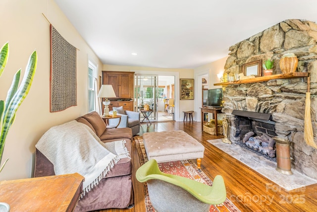 6 Craggy Cir, Asheville, NC 28803 - living area with wood finished floors and a stone fireplace