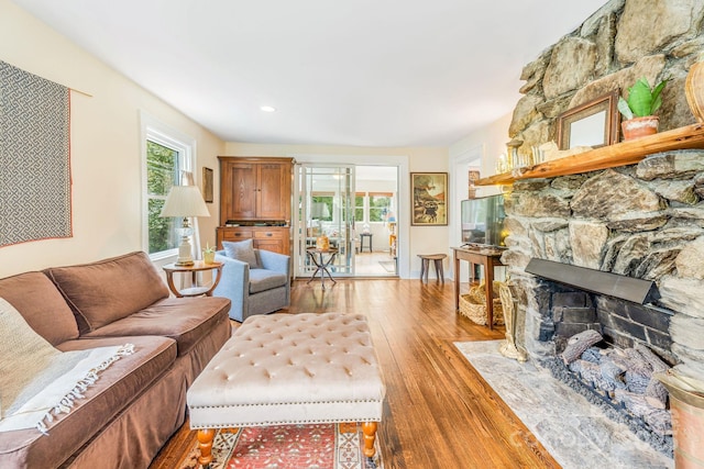 6 Craggy Cir, Asheville, NC 28803 - living room featuring wood finished floors and a fireplace