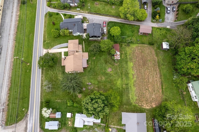 aerial overview of property's location with nearby suburban area