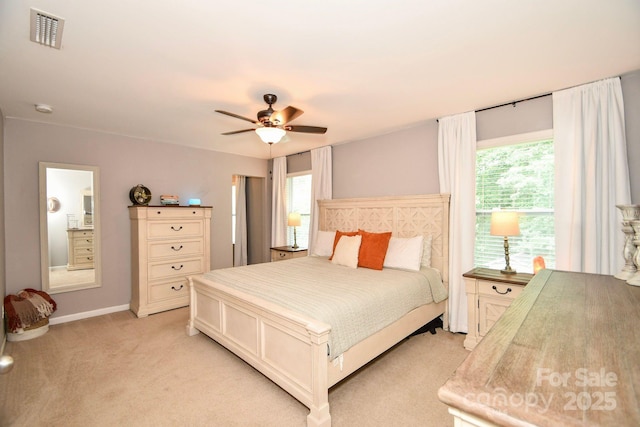 120 Tranquil Ct, Locust, NC 28097 - bedroom featuring light carpet, multiple windows, ceiling fan, and baseboards