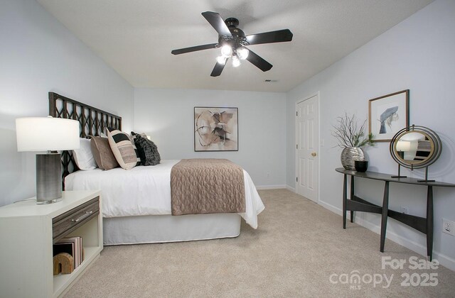 1610 Ford St, Charlotte, NC 28216 - bedroom featuring light colored carpet, baseboards, and ceiling fan