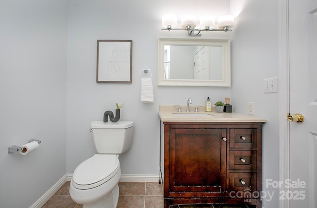 1610 Ford St, Charlotte, NC 28216 - bathroom featuring baseboards, toilet, and vanity