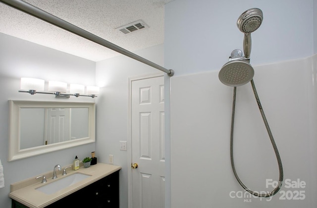 1610 Ford St, Charlotte, NC 28216 - full bath featuring a textured ceiling and vanity