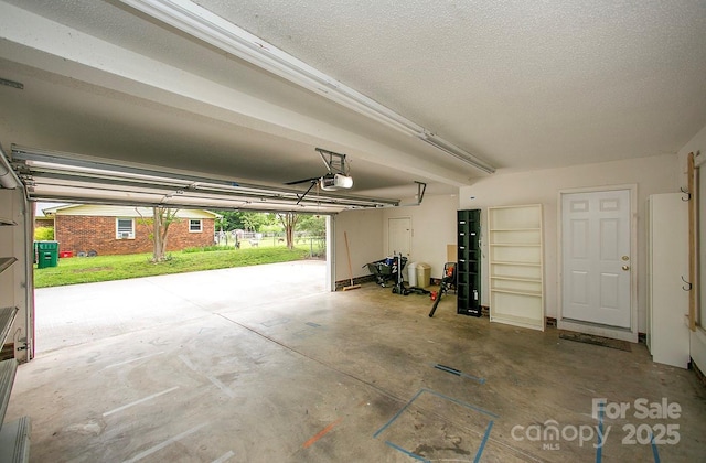 1610 Ford St, Charlotte, NC 28216 - garage featuring a garage door opener