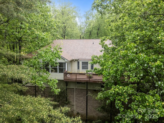 5 Governors Dr, Hendersonville, NC 28791 - back of house with a wooden deck, roof with shingles, and a sunroom
