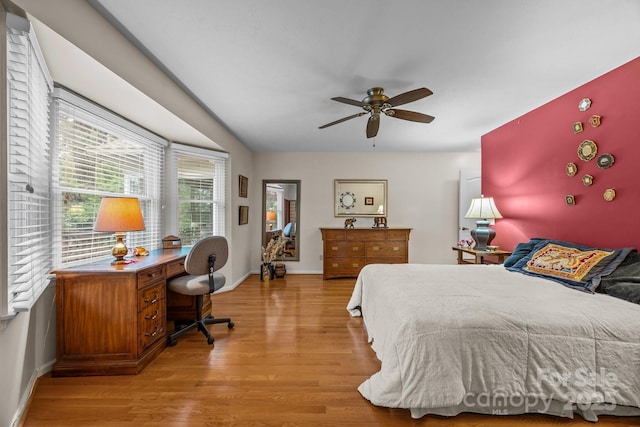 5 Governors Dr, Hendersonville, NC 28791 - bedroom with light wood finished floors, baseboards, an office area, and a ceiling fan