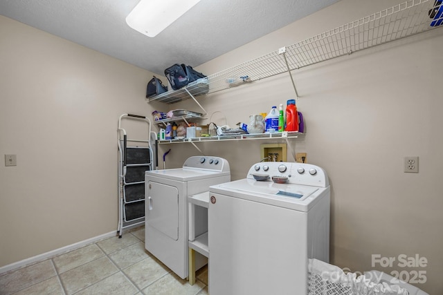 5 Governors Dr, Hendersonville, NC 28791 - laundry room with washing machine and clothes dryer, baseboards, and light tile patterned floors