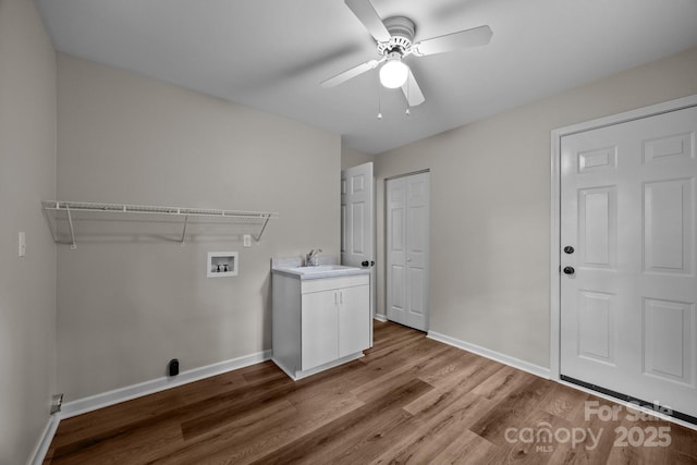 16 Lake Forest Ln, Hendersonville, NC 28739 - laundry room featuring washer hookup, cabinet space, wood finished floors, ceiling fan, and baseboards