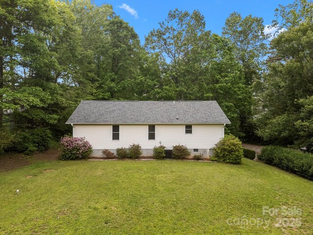 16 Lake Forest Ln, Hendersonville, NC 28739 - view of property exterior featuring a yard, central air condition unit, and crawl space