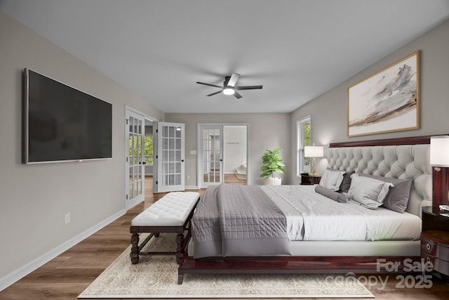 16 Lake Forest Ln, Hendersonville, NC 28739 - bedroom with french doors, multiple windows, baseboards, and wood finished floors